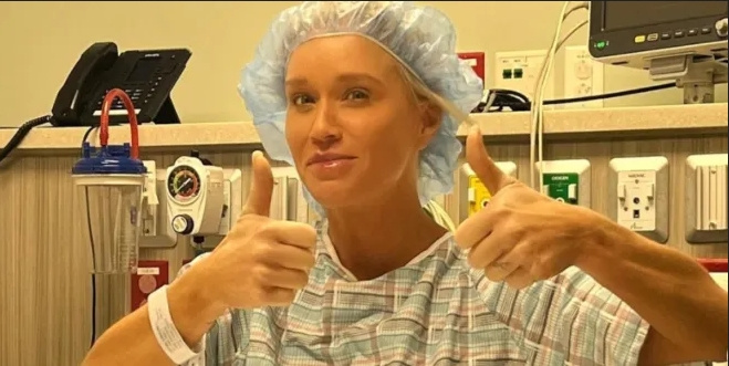 Manželka Luka Bryana Caroline zveřejnila obrázek po „nečekané operaci kyčle“